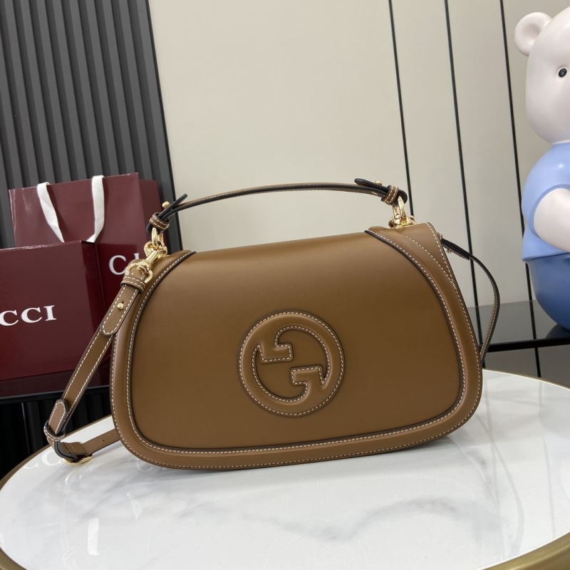 G*u*i top handle bags